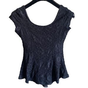 Woman’s Black Lace Overlay Peplum Style Top. Size XS